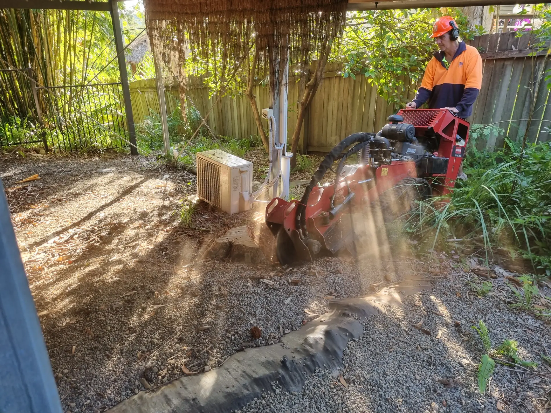 Single stump being ground down on a Sunshine Coast property